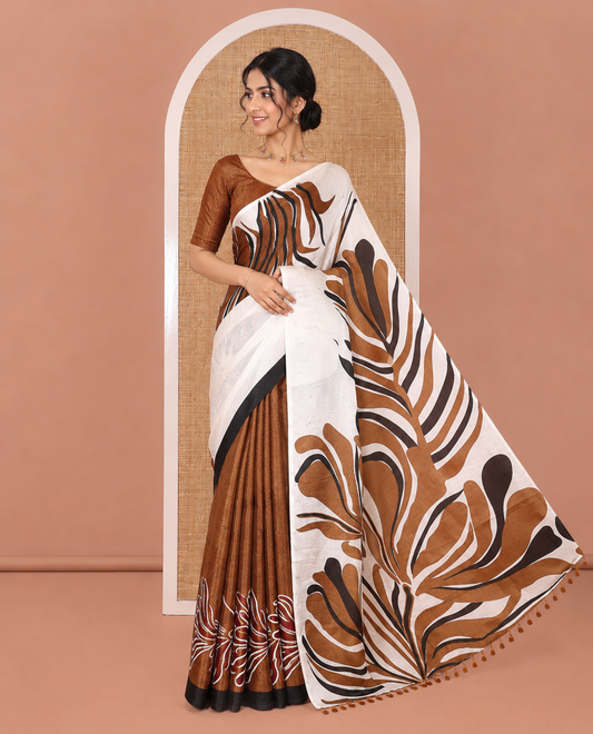 Borderless Cream and Brown Art Khadi Cotton Saree, Detailed with Batik Print-Style Vines Print on Its Body, Self-Pallu of Batik Print, and Paired with a Printed Blouse