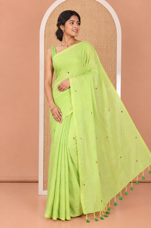 Borderless Parrot Green Mul Cotton Saree, Subtly Sparkled With Big Sequins Work On Its Body, a Self-Pallu and Paired with a Matching Blouse