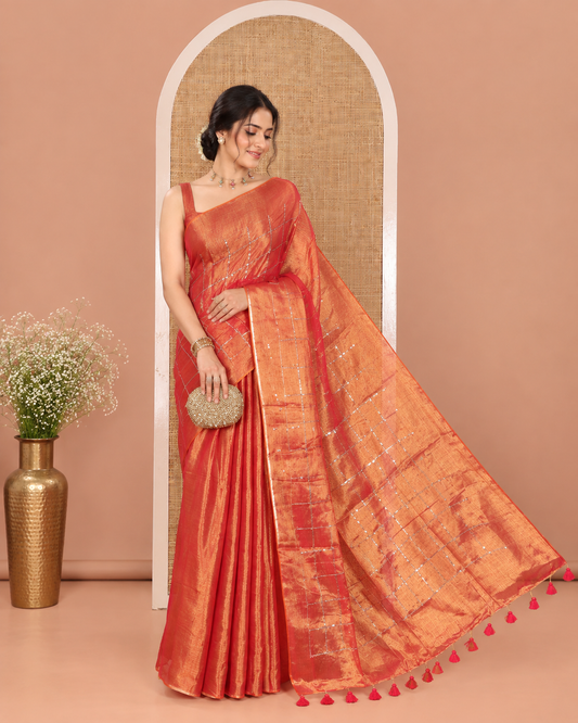 Borderless Orange Khadi Tissue Cotton Saree, Boldly Accentuated with Sequins Checks All Over Its Body, Sequins Checked Design Pallu, and Paired with a Matching Blouse