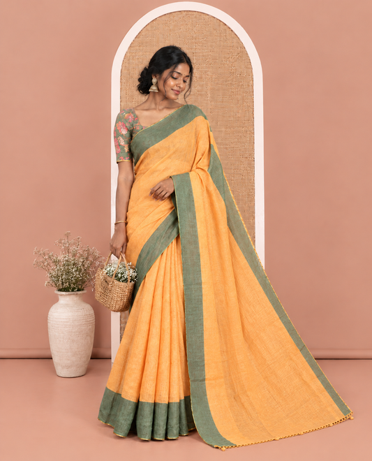 Yellow Plain Linen Cotton Saree, Contrast Plain Scallop Border, a Self-Pallu, and Contrast Kalamkari Printed Blouse
