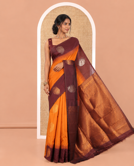 Rust Orange Art Soft Silk Saree, Elevated with Paisley Buttas All Over Its Body,  Complemented by a Contrast Paisley Motifs Border, an Intricately Designed Pallu, and Paired with a Contrast Blouse