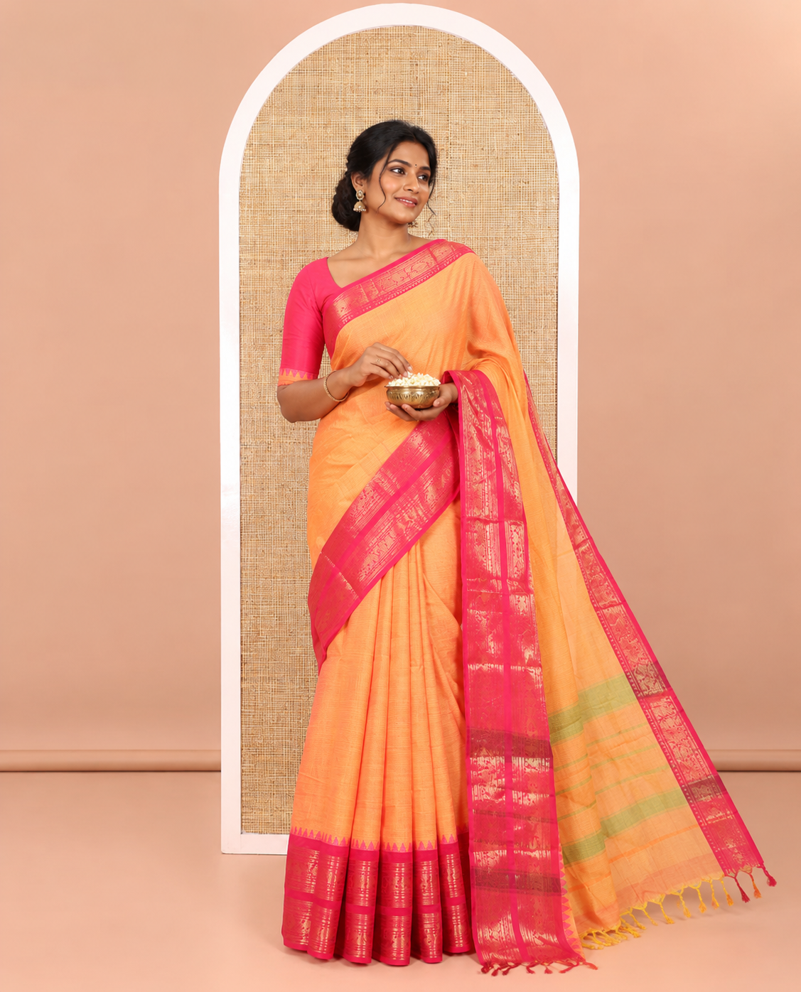 Orange Plain Chettinad Cotton Saree Highlighted with a Contrasting Temple Rettai Pettu Border of Peacock-Elephant Motifs, a Subtle Pallu of Stripes, and a Matching Blouse