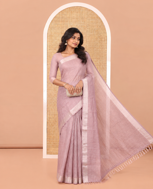Lavender Linen Zari Cotton Saree, Gleamed Up with Zari Stripes All Over Its Body, a Subtle Zari Border, a Self-Pallu, and Comes Without a Blouse