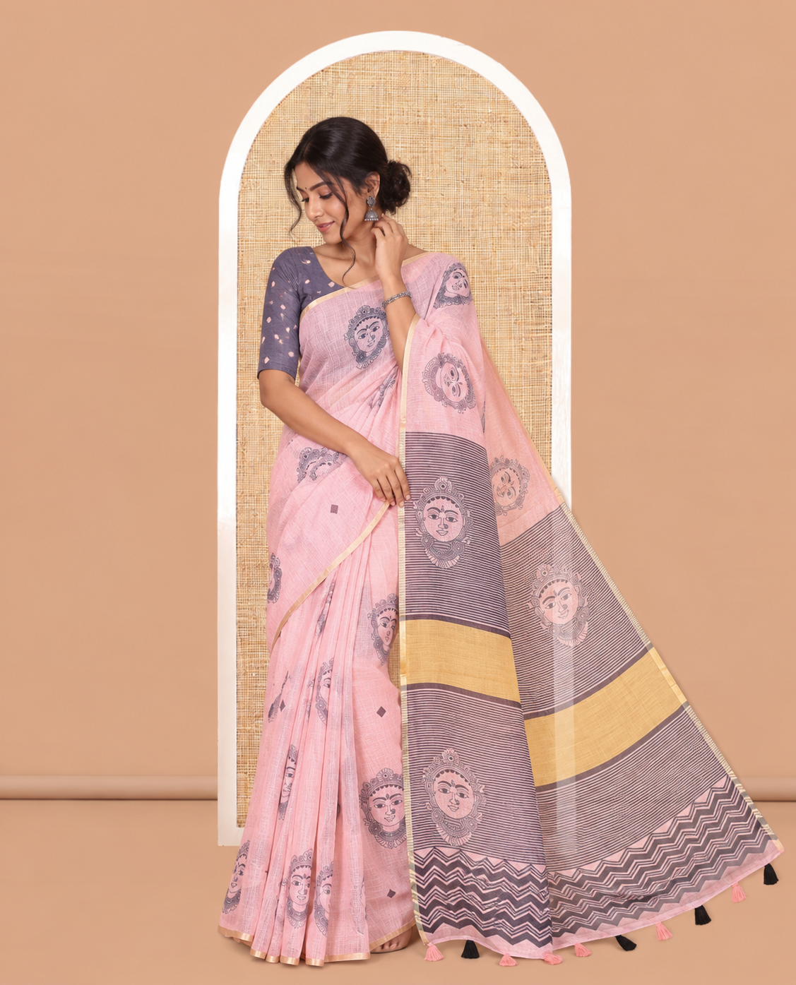 Borderless Peach Linen Cotton Saree, Elevated with Face Print, Contrast Pallu of Chevron Stripes and Face Print, a Contrast Blouse