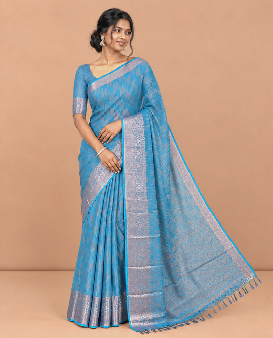 Blue Chiffon Saree, Richly Elevated with Ikat-Style Weave and Stonework, a Traditional Border, a Floral Design Pallu, and a Matching Blouse