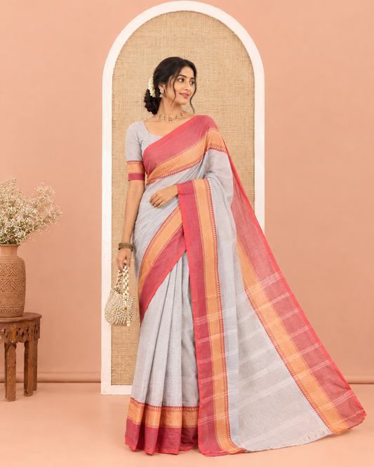 Grey Plain Chettinad Cotton Saree, Complemented by a Contrast Kal Eragina Traditional Temple Border, Subtly Striped Pallu, and Paired with a Matching Blouse