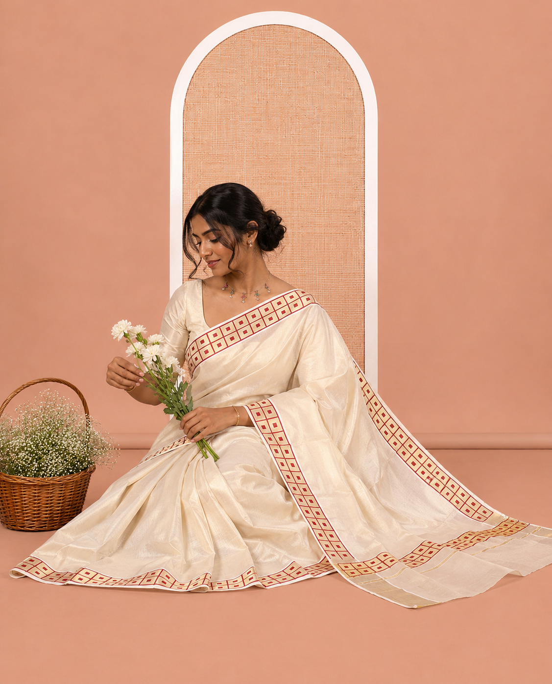 Gold-Maroon Plain Kerala Tissue Saree Features a Butta Enclosed Checked Border, and a Matching Blouse
