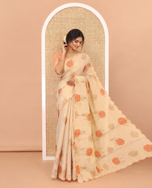 Gold and orange rose motifs printed with mirror work tissue saree, scallop embroidered border, printed pallu, and a contrast blouse