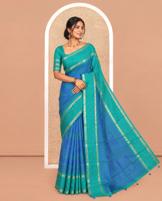 Blue Art Tussar Saree, Adorned with Kolam Buttas, a Contrast Rettai Pettu Rudraksham Border, Kolam Pallu, and a Contrast Blouse