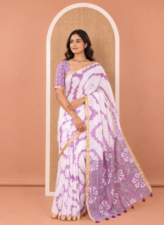 White-Violet Linen Cotton Saree, Bedecked with Shibori-Printed Body, Highlighted by Piping Border, Floral Printed Pallu, and a Contrast Blouse