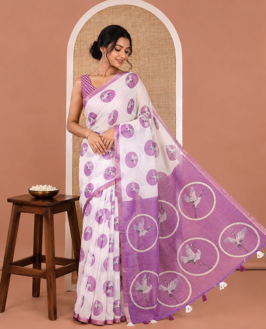White-Lavender Linen Cotton Saree, Steeped with Polka Dot Enclosed Crane Motifs on Its Body, Subtle Piping Border, Pallu Pictures Polka Dot Enclosed Crane Motifs, and Paired with a Matching Blouse
