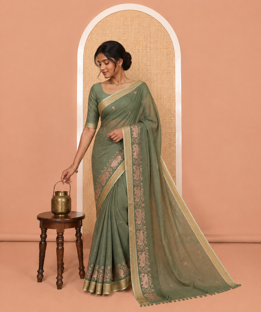 Green Chanderi Cotton Saree Features Floral-Elephant Embroidery, a Contrast Border, and a Matching Blouse