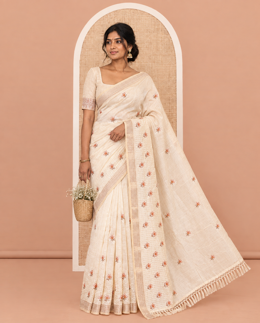 Cream Semi-Tussar Saree, Adorned with Floral Embroidery, a Self-Border, Embroidery Pallu, and a Matching Blouse