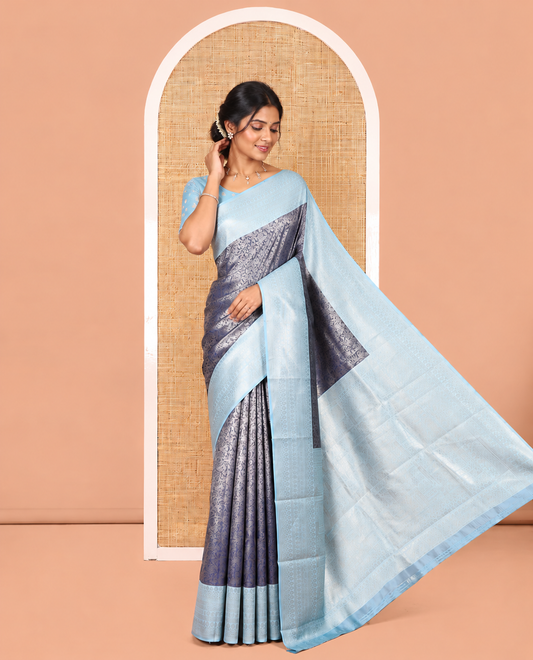 Navy Blue Kanchi Silk Saree Features Floral Jacquard, Contrast Traditional Border, Zari-Weave Pallu, and a Contrast Blouse