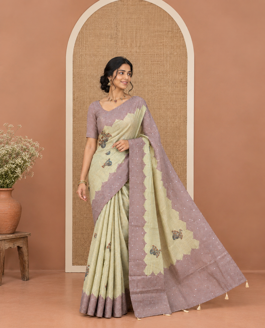 Blue Tissue Saree, Decorated with Floral Buttas and Mirrorwork, a Self-Border, Ogee Print Pallu, and a Matching Blouse