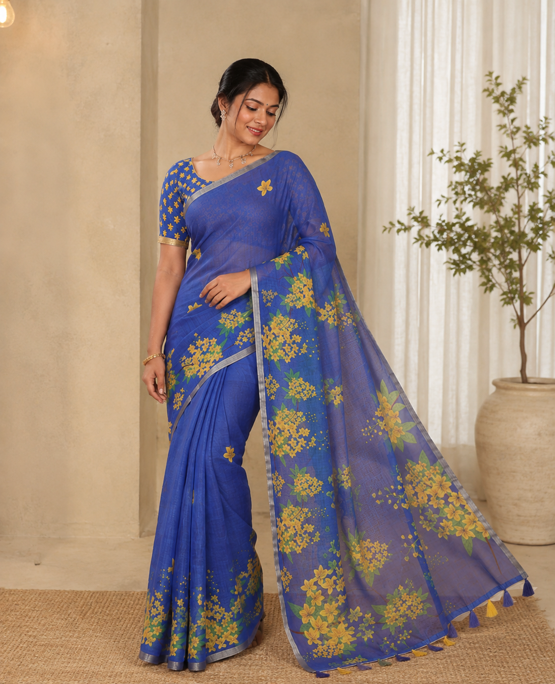 Blue Linen Saree, Beautified with Averrhoa Carambola-Style Floral Motifs Print, Subtle Piping Border, Pallu Mirrors the Same Print, and Paired with a Matching Blouse
