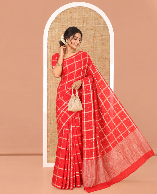 Borderless Red Assam Silk Saree, Richly Detailed with Bandhani-Dotted Ghar Chola Design on Its Body, Gleaming Zari Pallu, and Paired with a Matching Blouse