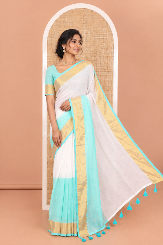 Cream and Sea Green Plain Khadi Mul Cotton Saree Features a Gleaming Zari Bavanji Border and a Contrast Sea Green Plain Blouse