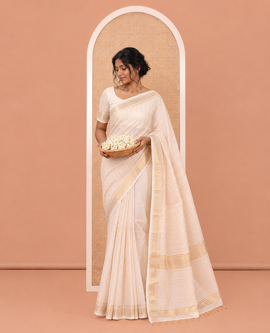 Cream Bhagalpur Cotton Saree, Steeped with Butta Enclosed Checks, a Zari Border, Self-Pallu, and a Matching Blouse