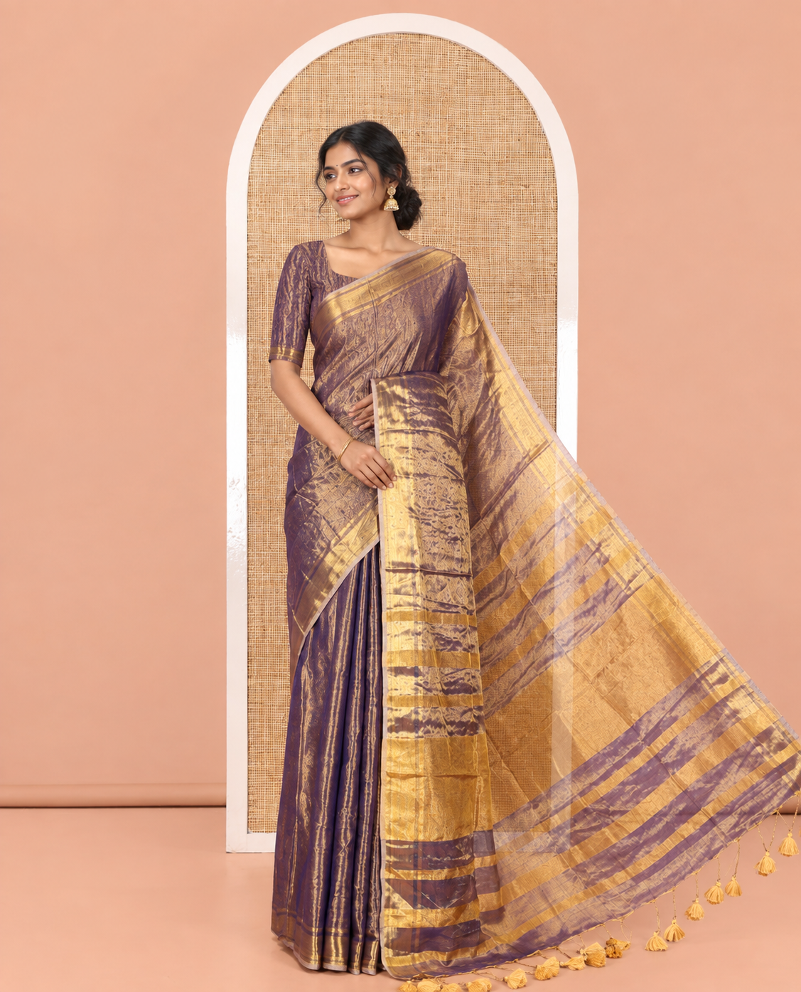 Navy Blue Plain Khadi Tissue Saree, a Gleaming Zari Bavanji Border, Golden Zari Striped Pallu, and Paired with a Matching Blouse