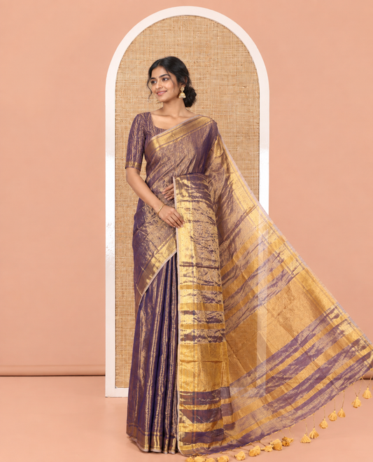 Navy Blue Plain Khadi Tissue Saree, a Gleaming Zari Bavanji Border, Golden Zari Striped Pallu, and Paired with a Matching Blouse