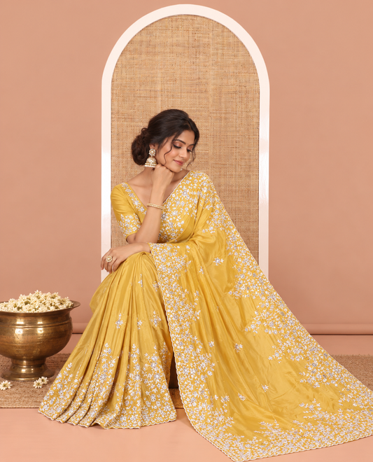 Mustard Plain Satin Crepe Saree, Accentuated with Floral Vine Thread Embroidery on Its Border, a Self-Pallu, and Paired with a Matching Blouse