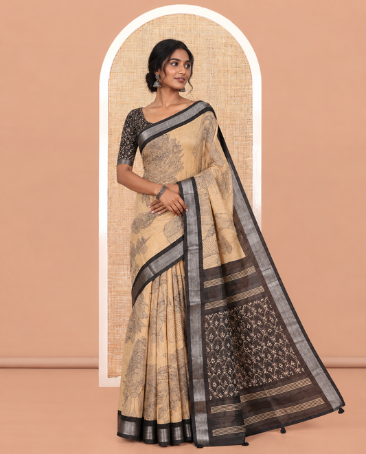 Chikku Jute Linen Saree, Decked Up with Tropical Floral Print, a Contrast Zari Border, Geometric Printed Pallu, and a Contrast Blouse