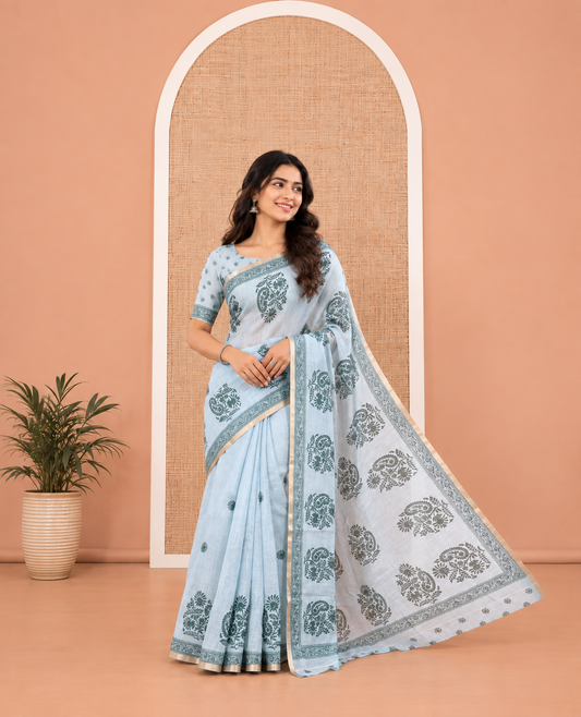 Blue Linen Cotton Saree, Artfully Designed with Floral-Paisley Motifs Print All Over Its Body, Highlighted by Gold Zari Printed Border, Floral-Paisley Printed Pallu and Paired with a Matching Blouse