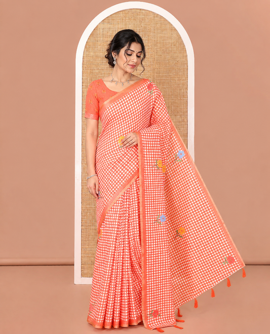 Orange Linen Cotton Saree, Decked up with Micro-Checks and Floral Motifs on Its Body, Subtle Piping Border, a Self-Pallu, and Paired with a Rose Floral Printed Blouse