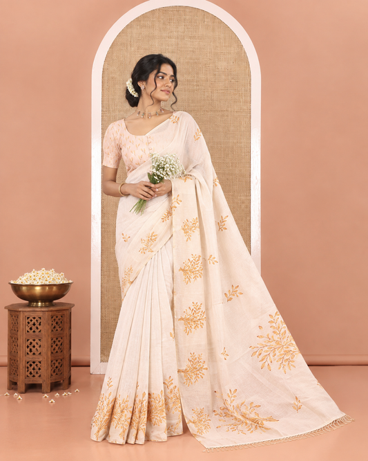 Cream Tissue Saree, Entralled with Leaf Motifs Printed On Its Body, Self-Border, Floral Printed Pallu, and Paired with a Printed Blouse