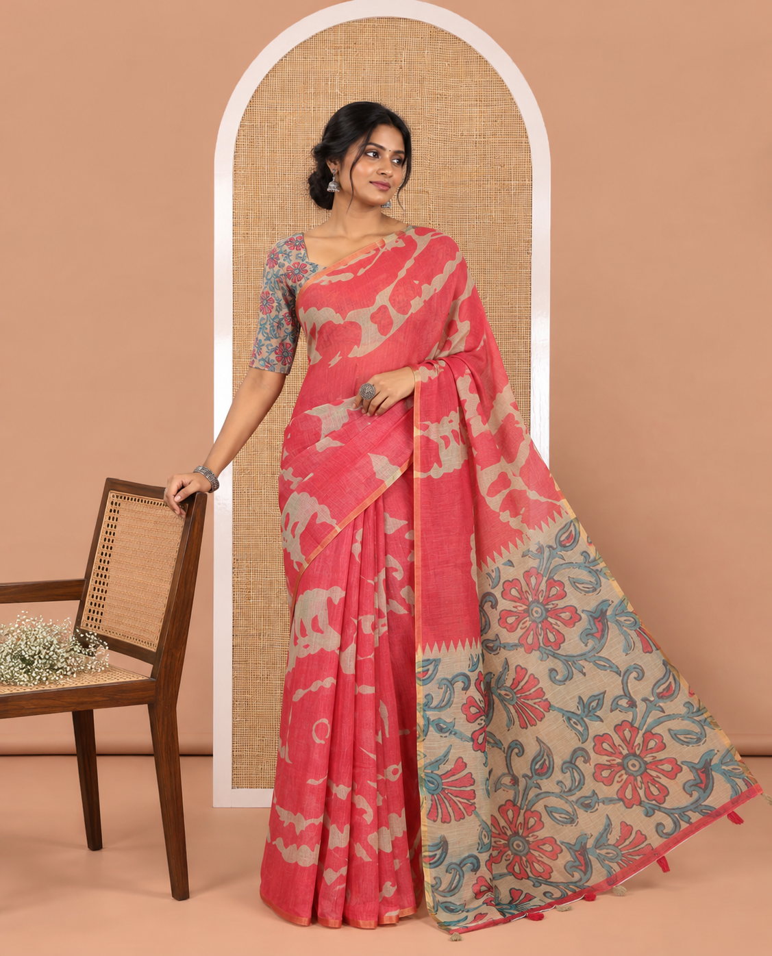 Pink Linen Saree, Decked up with Abstract-Style Print on Its Body, Subtle Piping Border, Captivating Pallu of Floral Vine Print, and Paired with a Contrast Floral Printed Blouse