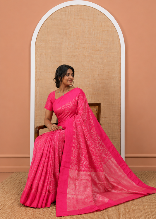 Rani Semi-Tussar Saree, Embellished with Floral Jacquard Design, an Embossed Border, a Floral Pallu, and a Matching Blouse