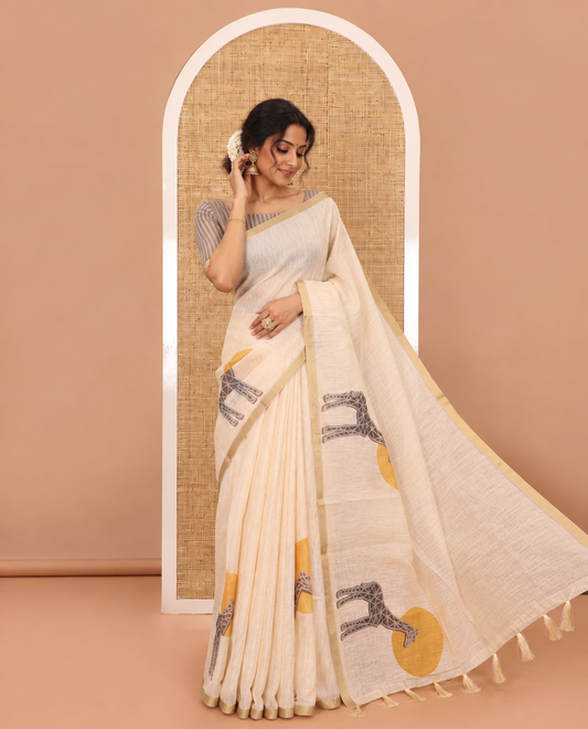 Cream plain & giraffe motifs printed linen cotton saree, zari piping border, giraffe printed pallu & vertical striped blouse