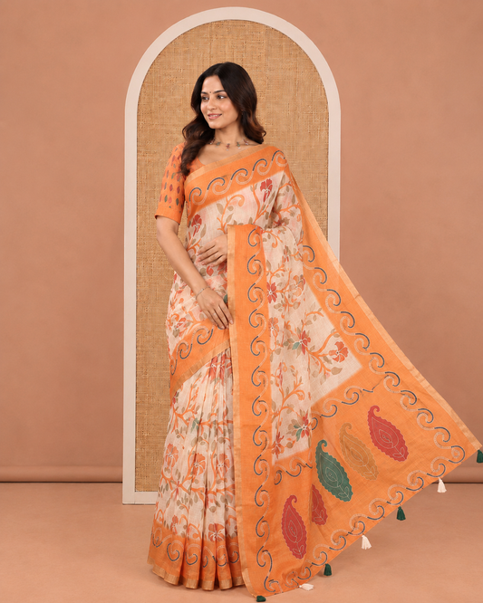Orange Linen Cotton Saree Features Floral Vine Print, a Contrast Border, Paisley-Printed Pallu, and a Contrast Blouse