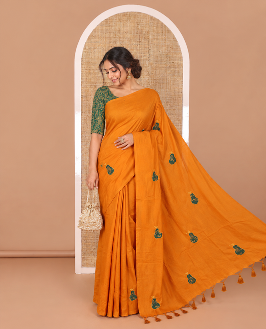 Borderless mustard pear fruit-shaped patchwork South cotton saree with a matching blouse and a contrast paisley vine printed blouse