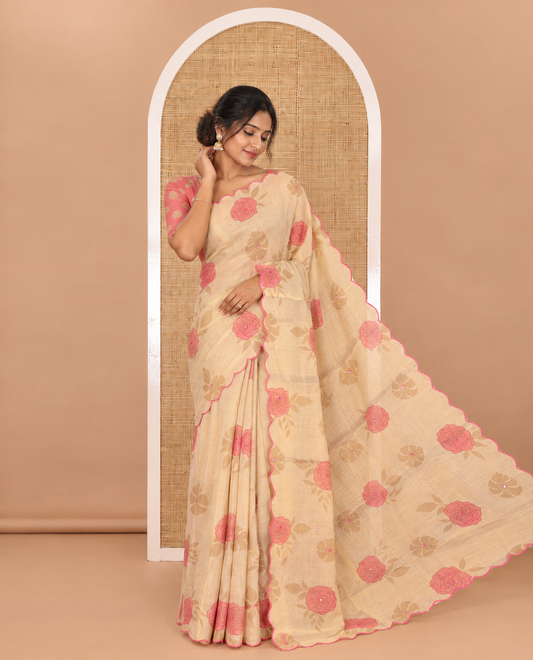 Gold and pink rose motifs printed with mirror work tissue saree, scallop embroidered border, printed pallu, and a contrast blouse
