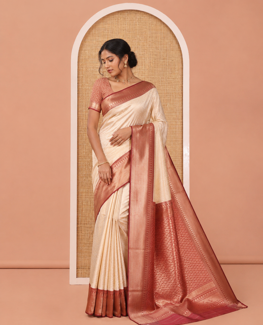 Cream-Maroon Embossed Art Kanchi Silk Saree, a Contrast Traditional Zari Border, Grand Jaal Pallu, and a Contrast Blouse