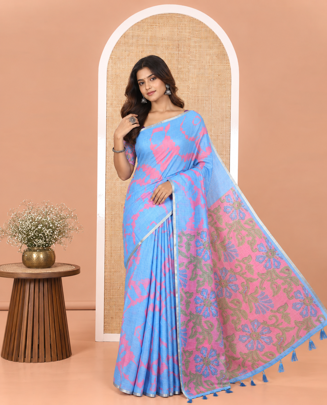 Light Blue Linen Cotton Saree, Graced with Shibori Printed on Its Body, Subtle Piping Border, Pallu Features Floral Print, and Paired with a Contrast Floral Printed Blouse