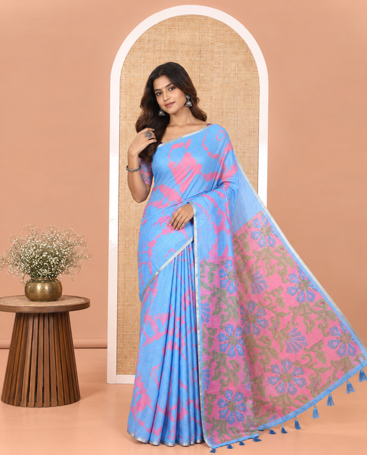 Light Blue Linen Cotton Saree, Graced with Shibori Printed on Its Body, Subtle Piping Border, Pallu Features Floral Print, and Paired with a Contrast Floral Printed Blouse