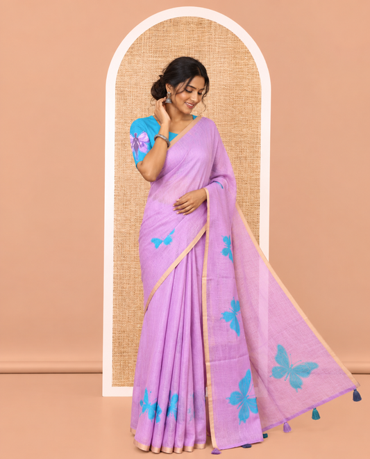 Lavender Linen Cotton Saree, Featuring Butterfly Buttas All Over Its Body, Subtle Piping Border, Pallu of Butterfly Print, and Paired with a Contrast Fairy Motifs Printed Blouse