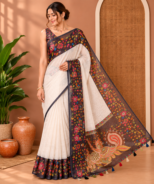 Cream Plain Linen Cotton Saree, a Contrast Kalamkari Floral-Printed Border, Peacock Pallu, and a Contrast Blouse