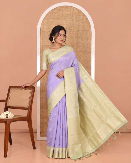 Lavender Elite Soft Silk Saree, Features Zari Buttas, Contrast Meenakari Floral Creeper Zari Border, Intricately Woven Pallu and a Contrast Blouse