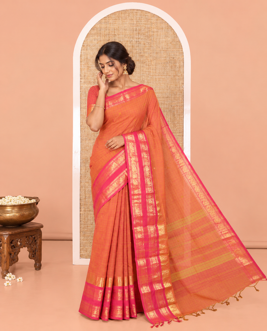 Orange Chettinad Cotton Saree, Subtly Enriched with Thread Buttas and Checks on Its Body, Complemented by a Contrast Temple Traditional Zari Design Rettai Pettu Border, Subtly Striped Pallu, and Paired with a Matching Blouse