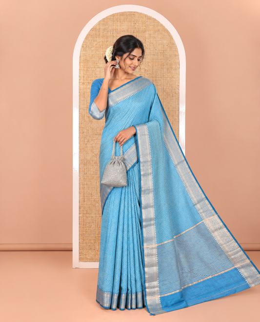 Blue Semi-Tussar Saree Accentuated with Zig-Zag Strips Prints, Featuring a Self-border with Traditional Motifs, a Zari-Striped Pallu, Paired with a Matching Blouse