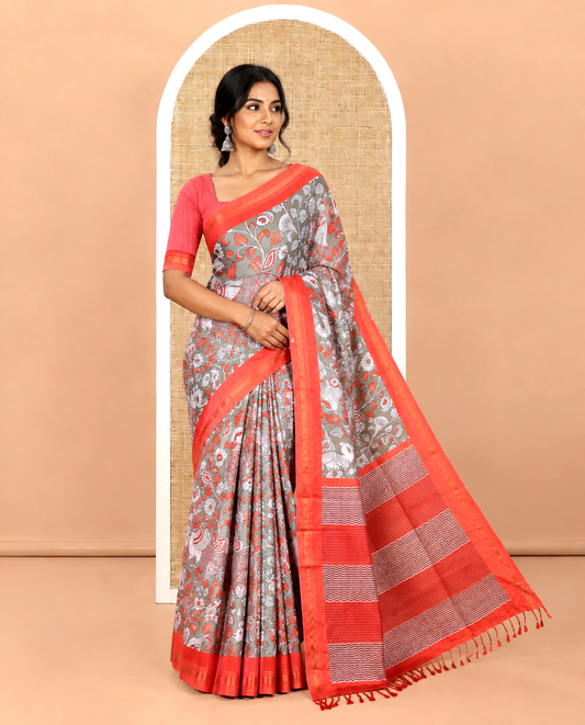 Sage Green Manipuri Silk Saree, Accentuated with Kalamkari-Style Floral Vine and Peacock Motifs Printed All Over Its Body, Complemented by a Contrast Zari Border, Pallu of Chevron Stripes, and Paired with a Contrast Blouse