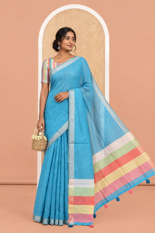 Blue Plain Semi-Tussar Saree, a Zari Border, Multi-Colored Striped Pallu, and a Contrast Blouse