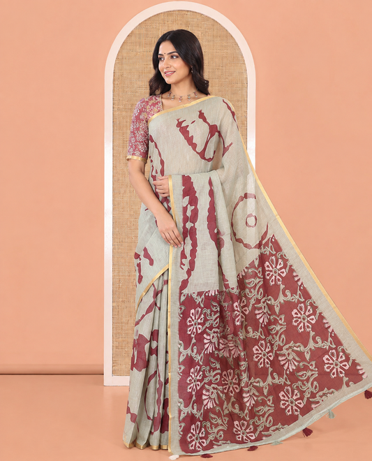 Pista Green Linen Cotton Saree, Adorned with Shibori Print, Gold Piping Border, Contrast Floral Printed Pallu, and Contrast Floral Printed Blouse