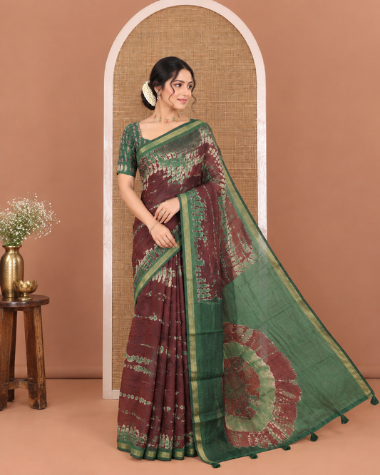 Brown Muslin Cotton Saree, Adorned with Marble-Textured Shibori Printed All Over Its Body, Subtle Piping Border, Pallu of Shibori Print, and Paired with a Contrast Blouse