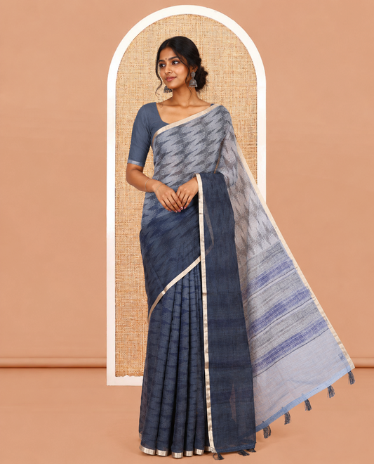 Blue Linen Cotton Saree, Adorned with Ikat Zig-Zag Stripes, a Piping Border, Printed Pallu, and Matching Blouse