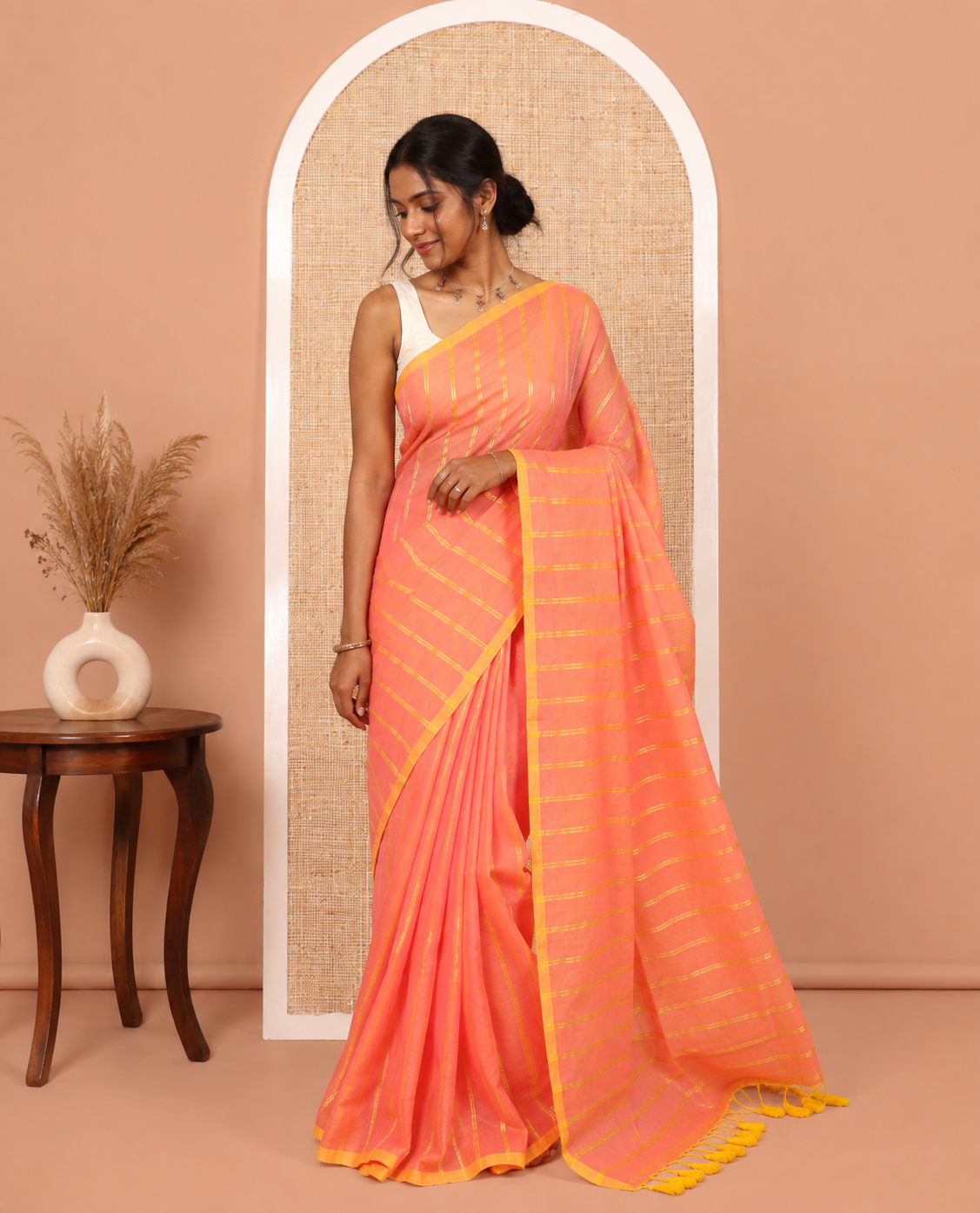 Borderless Pink Khadi Mul Cotton Saree, Adorned with Vertical Zari Stripes, a Self-Pallu, and No Blouse